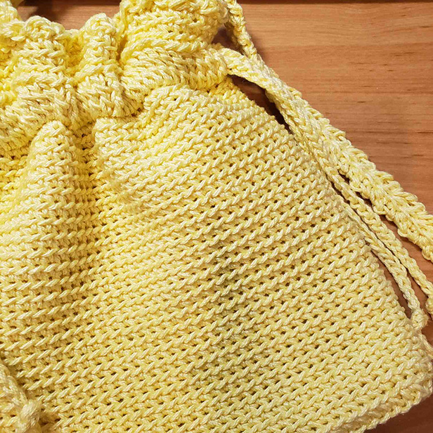 yellow crochet drawstring bag